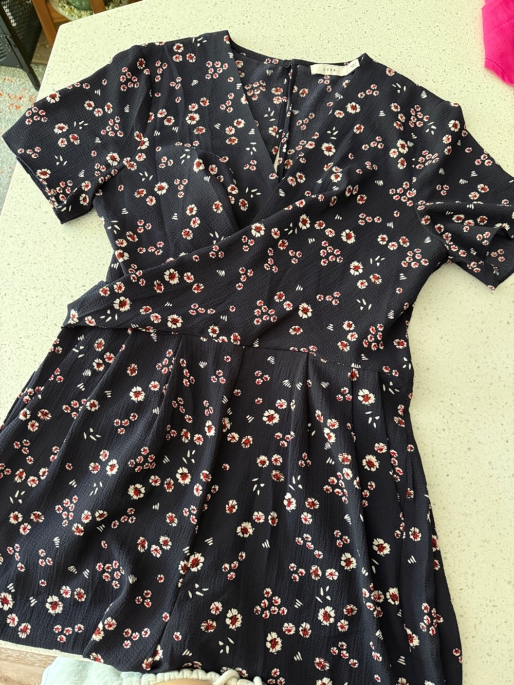 Lush Navy Floral Wrap Romper - Black Navy with White & Red Blossoms